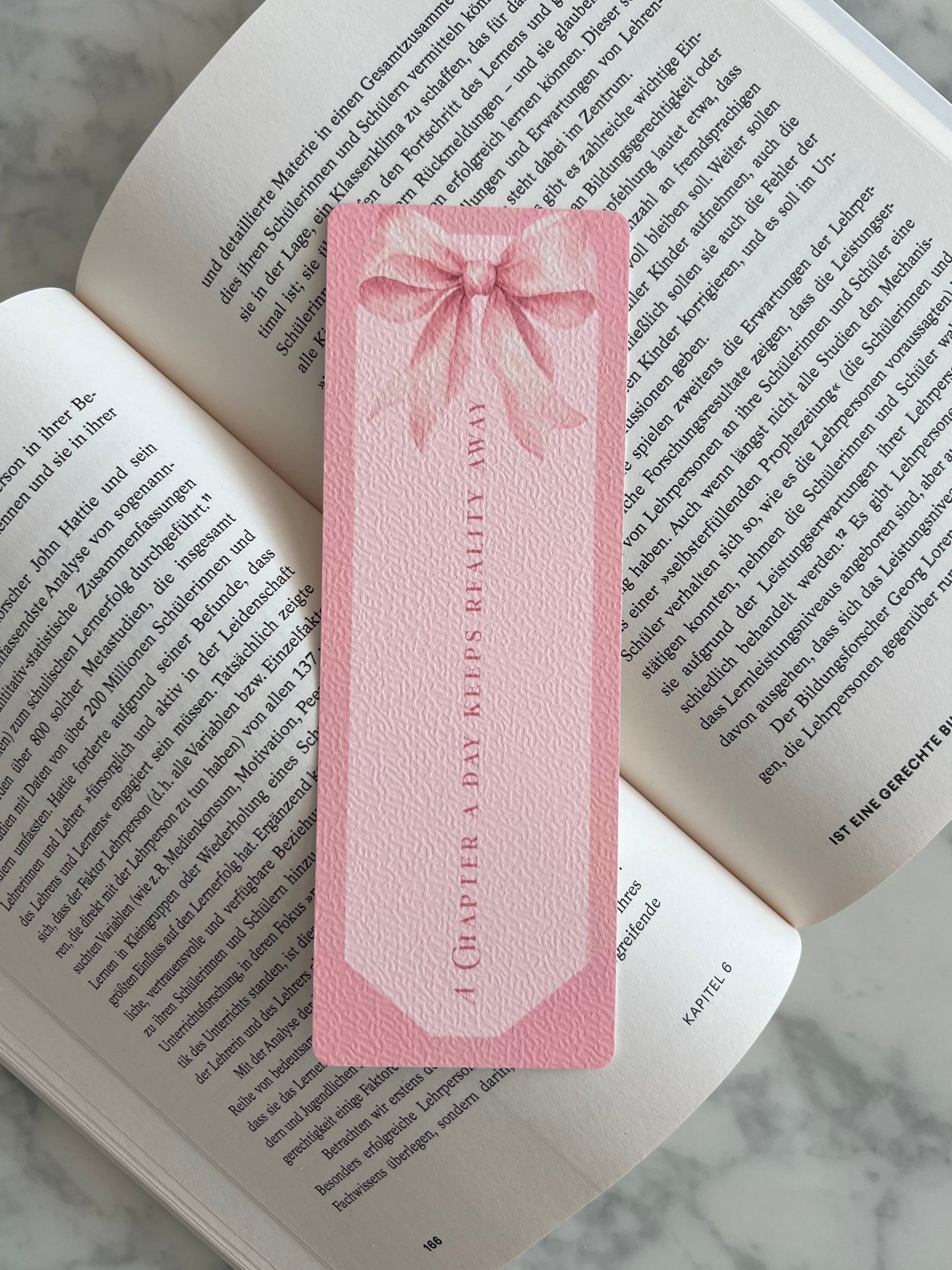 A Chapter a Day keeps reality away - Bookmark